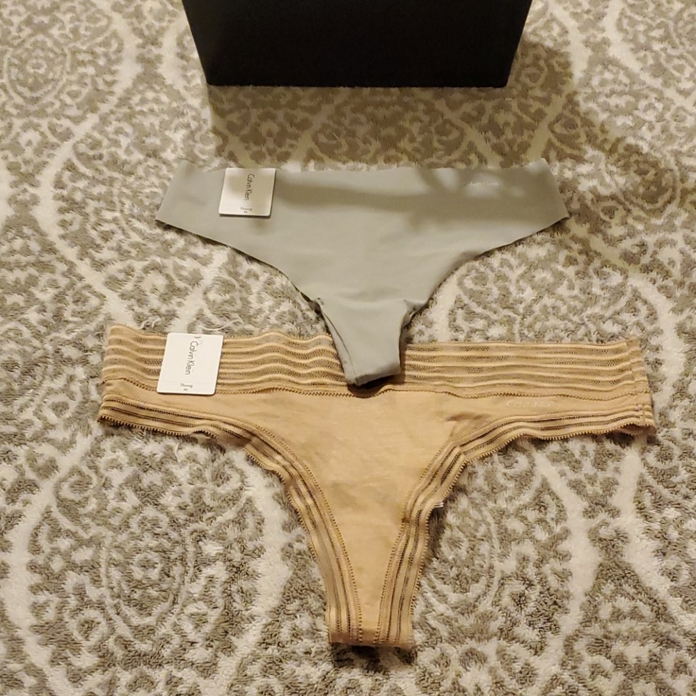 2 Calvin Klein thongs new